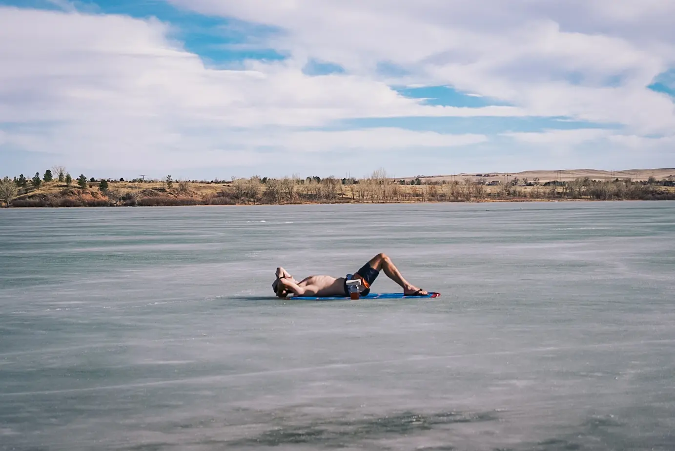 Sunbathing on a frozen lake, 2021